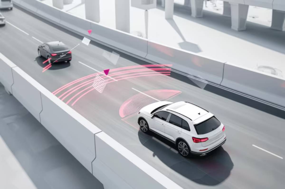 A white SUV using advanced driving assistance technology on a highway, highlighted with digital indicators showing lane detection.