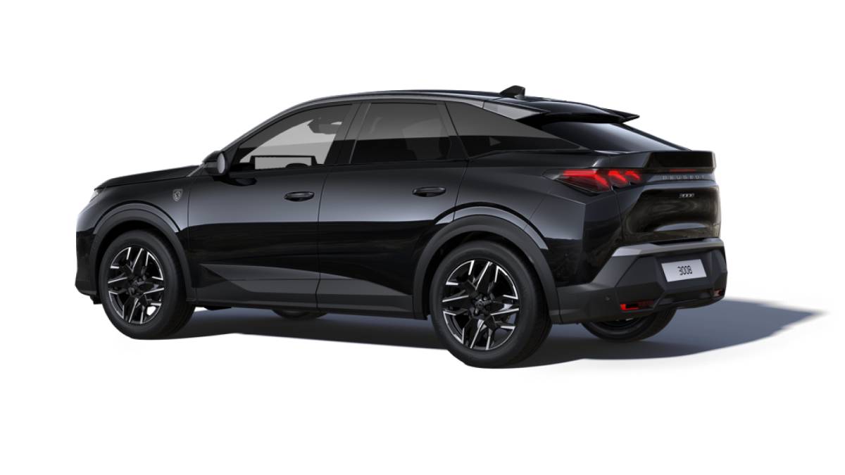 A sleek black SUV captured from a rear angle, showcasing its modern design and stylish details, including sporty wheels and taillights.